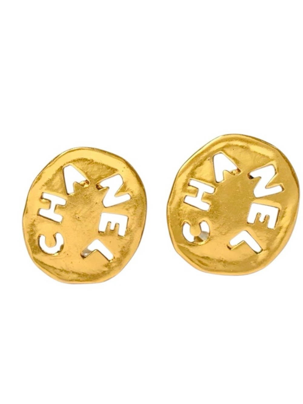 Authentic CHANEL 1980s cut out gold plated clip on earrings